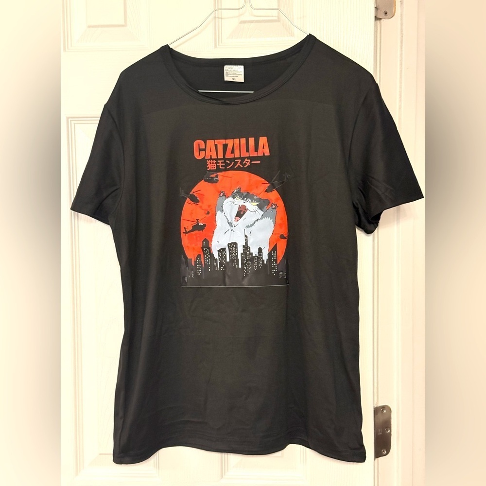 Unique Black Catzilla Graphic Short Sleeve T-Shirt Featuring Multicolor Accents